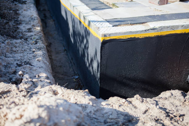 Professional Waterproofing technician working in Wenonah, NJ